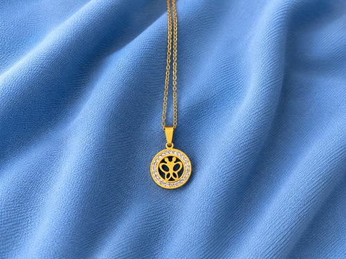 Sparkling golden butterfly charm necklace